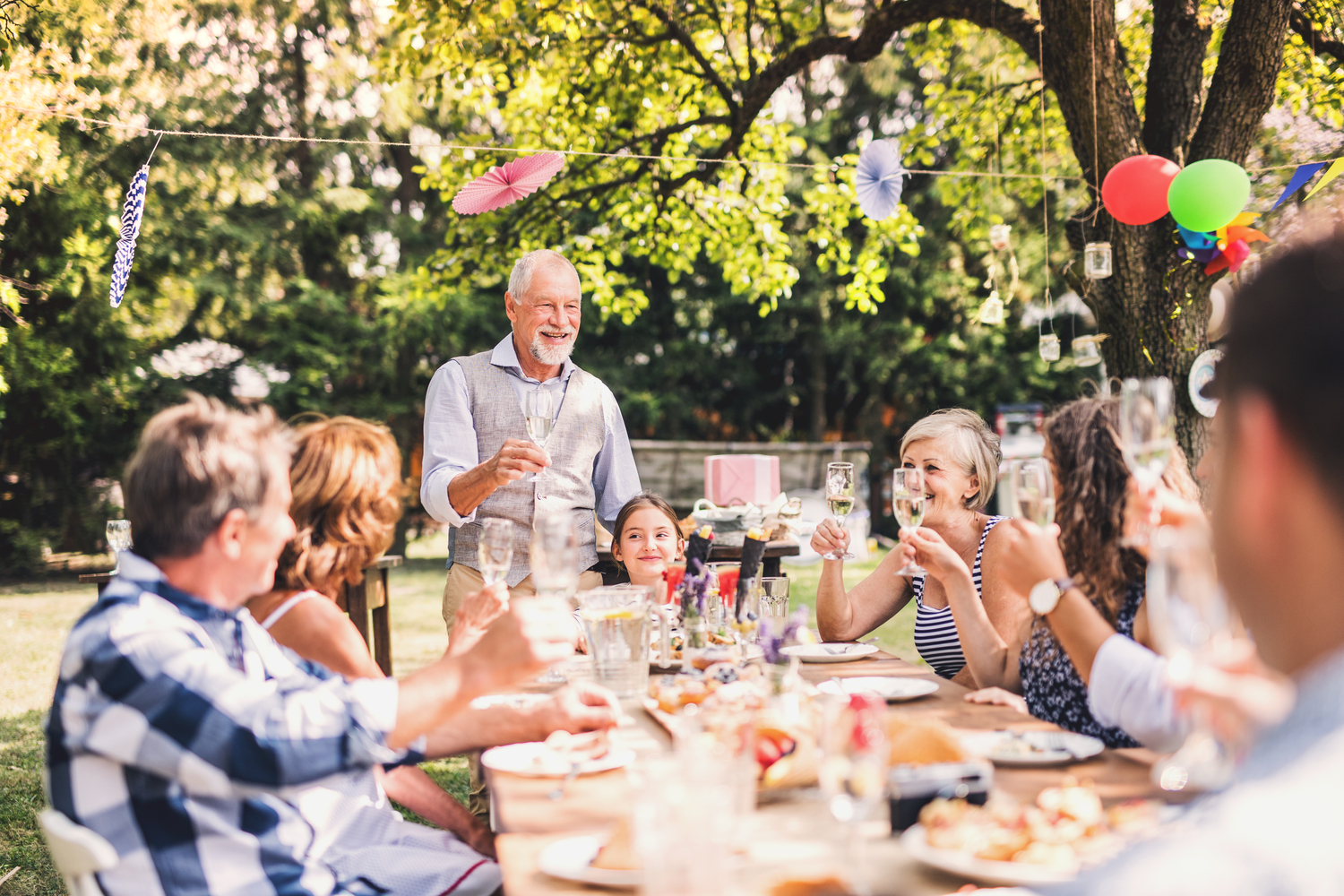 Family,Celebration,Or,A,Garden,Party,Outside,In,The,Backyard.